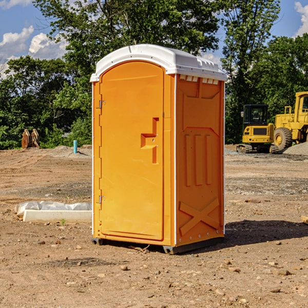 how often are the portable restrooms cleaned and serviced during a rental period in Bock MN